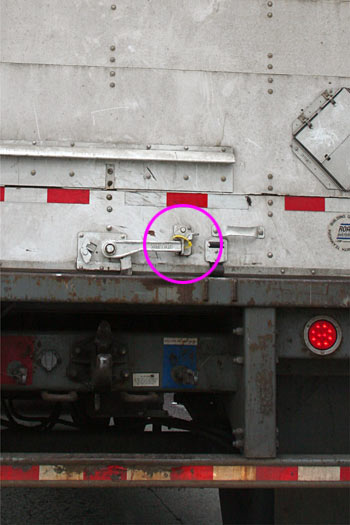 Truck latch fastened with zip tie