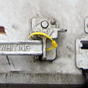 Truck latch fastened with zip tie